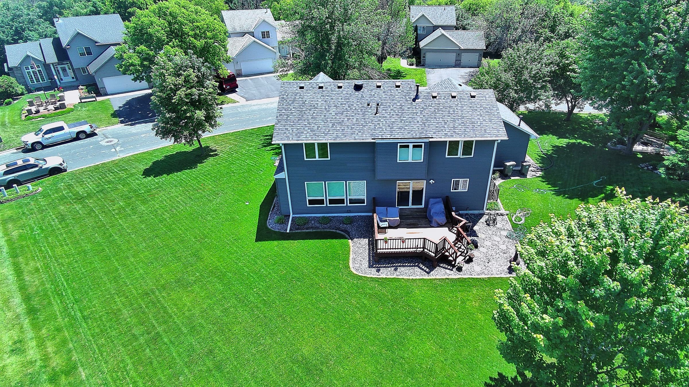 Aerial view of a Twin Cities home with a completed Ace roof replacement